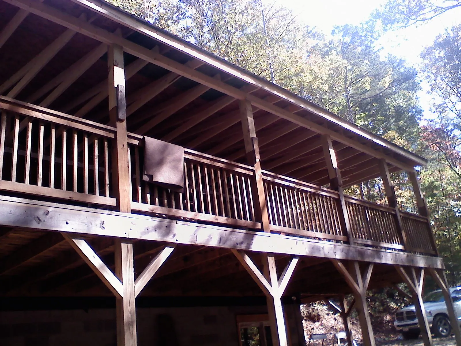 Timber framing under a new elevated porch and deck — Roof Leak Repair in Hillsborough by Roofing Brothers